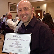 Dr. Rob Wilson with his Sigma Award